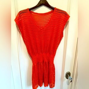 Swimsuit coverup. Color: orange. Size: medium. Excellent condition.